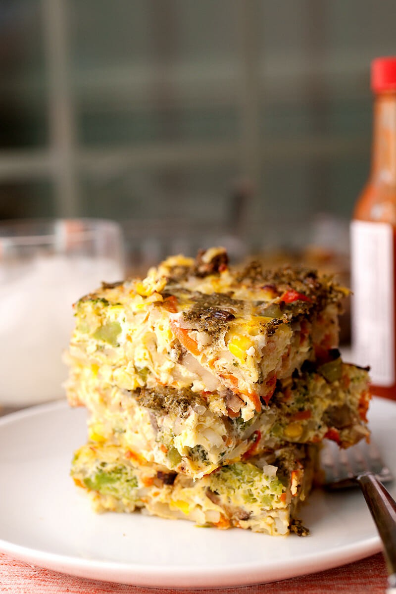 7 Veggie Pesto Breakfast Casserole: This breakfast casserole has about as many veggies as you can pack into one dish. Rather than cheese, I like to stir in pesto for a big flavor boost! Eat a good breakfast, people! | macheesmo.com
