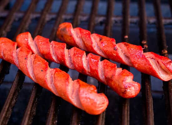 Grilling the hot dogs.