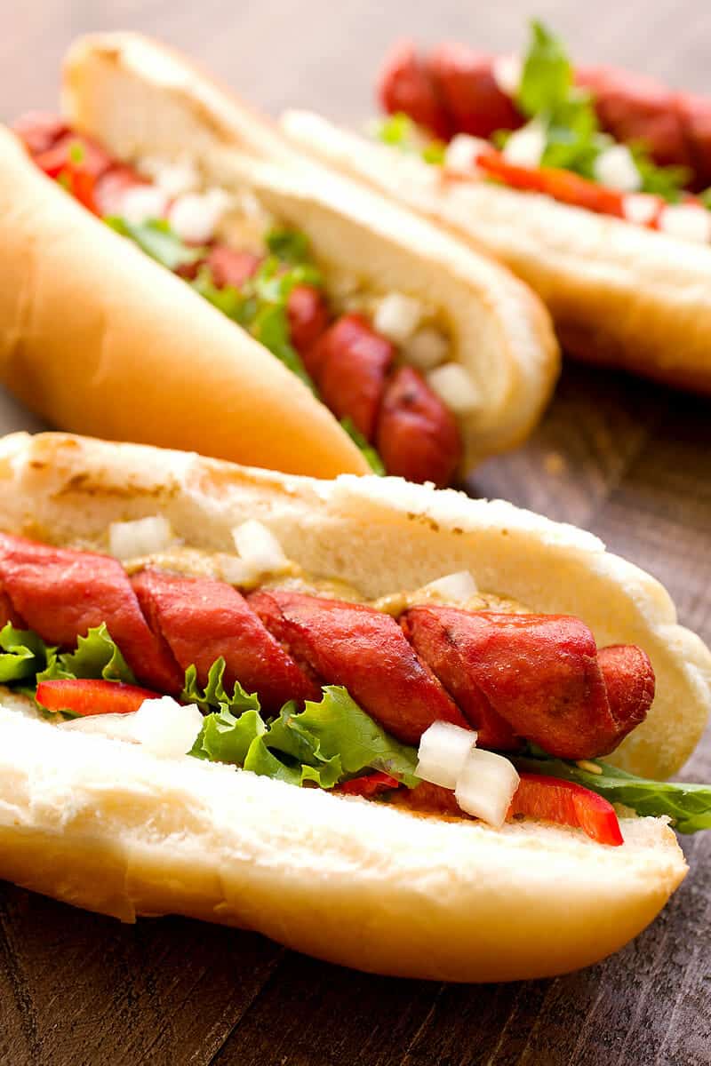 How to Make Spiral Hot Dogs: You are one quick tip away from completely changing your grilling game this year. This fast prep takes your average hot dog to a whole new level. They get crispy and perfect for lazy day grilling. Learn how to do it right! | macheesmo.com