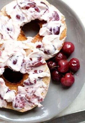 Roasted Cherry Cream Cheese: Not a bagel topper you can buy in the store, but a perfect one to make at home when delicious ripe cherries are in season. Lemon, honey, and packed full of roasted sweet cherries. | macheesmo.com