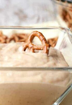 Peanut butter yogurt dip with pretzels is a delicious snack for your kids. It's just four ingredients and keeps in the fridge for a few days.