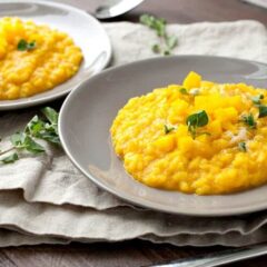 Creamy Golden Risotto: This colorful bright risotto is mixed with beets and carrots. The root veggies give the risotto a nice sweetness and beautiful color. How could you not want a big bowl of this stuff?! | macheesmo.com