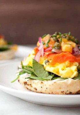 Mile High Open-Faced Bagels: These stacked beauties are too big to sandwich! You have to just build them on half a bagel due to all the wonderful toppings. Also, they can be ready to eat in literally 10 minutes. So fast and perfect for a surprisingly light and delicious breakfast or brunch. | macheesmo.com