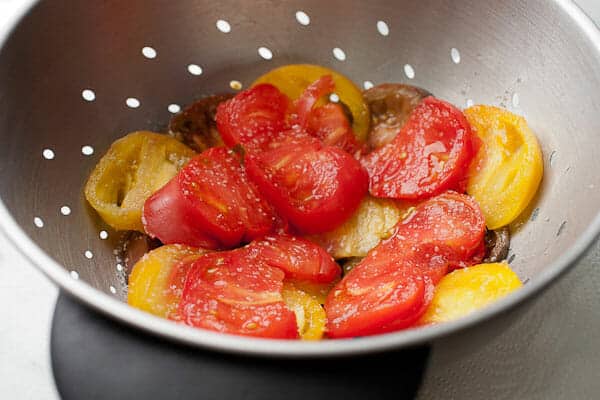 Prepping the tomatoes.