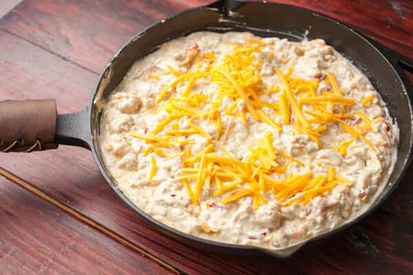 Cheeese added to baked shrimp dip.