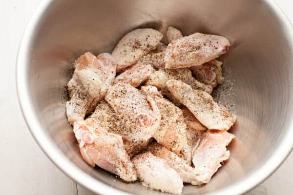 Seasoned wings ready to bake.