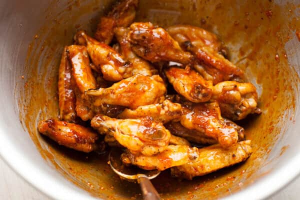 Sauced and tossed wings.