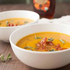 Butternut Squash Soup with Maple Bacon: Say hello to fall with this delicious roasted squash soup. The soup itself is really easy but gets a nice crunch and sweetness from crumbled maple bacon on top! YUM! | macheesmo.com