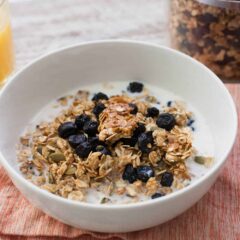 Hemp Seed Pumpkin Granola: Crunchy granola with loads of fiber. I like to add just a touch of sweetness with real honey and dried blueberries. Very good with milk or yogurt! | macheesmo.com