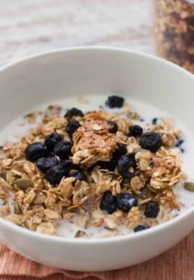 Hemp Seed Pumpkin Granola: Crunchy granola with loads of fiber. I like to add just a touch of sweetness with real honey and dried blueberries. Very good with milk or yogurt! | macheesmo.com