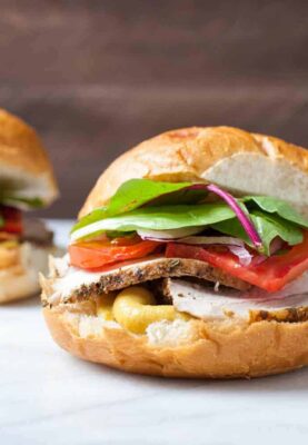 Balsamic Roasted Pork Sandwiches: Slow roasted pork glazed with a simple balsamic sauce, sliced thin, and served with honey mustard sauce and fresh veggies. Such a great sandwich! | macheesmo.com