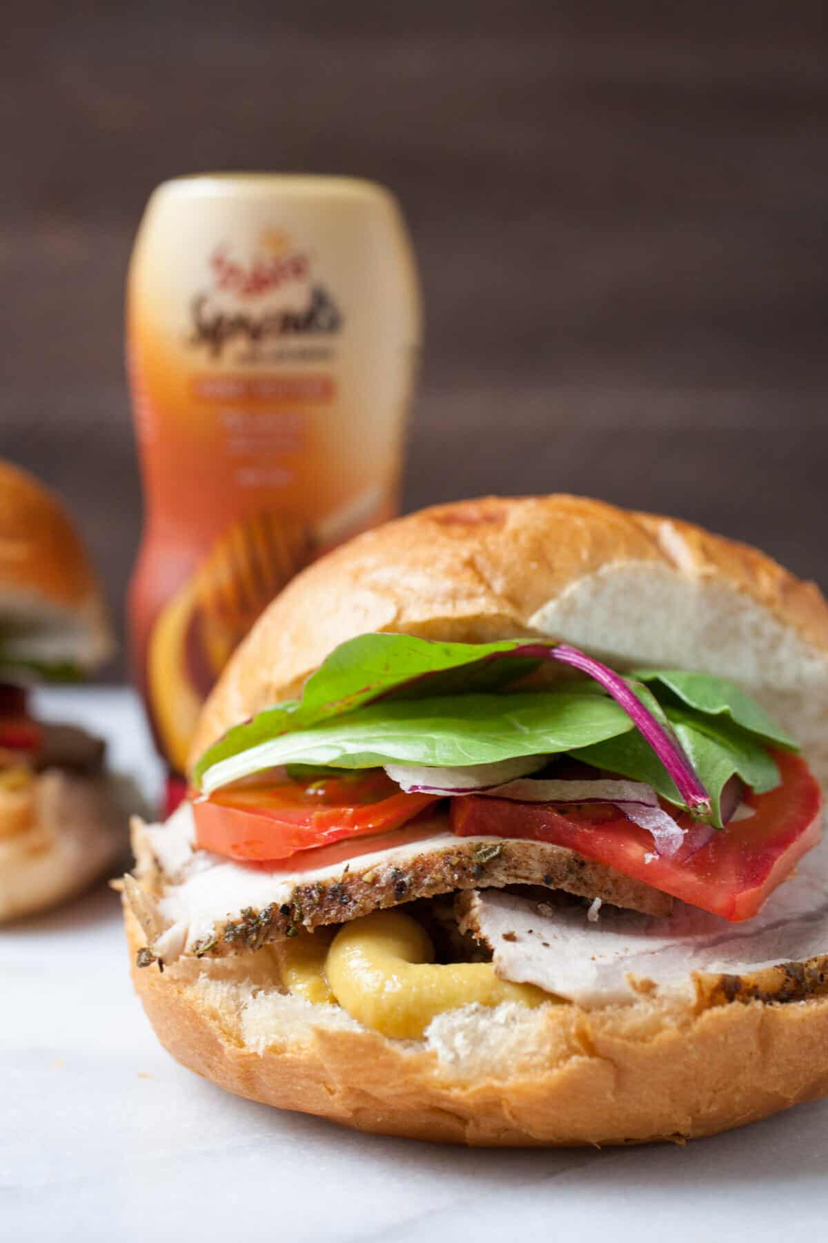 Balsamic Roasted Pork Sandwiches: Slow roasted pork glazed with a simple balsamic sauce, sliced thin, and served with honey mustard sauce and fresh veggies. Such a great sandwich! | macheesmo.com