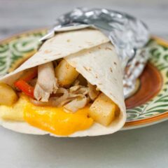 Rotisserie Chicken Breakfast Burritos: These super-cheesy and delicious breakfast burritos use one of my favorite meal shorted (rotisserie chicken) so they are ready to go in just a few minutes! | macheesmo.com