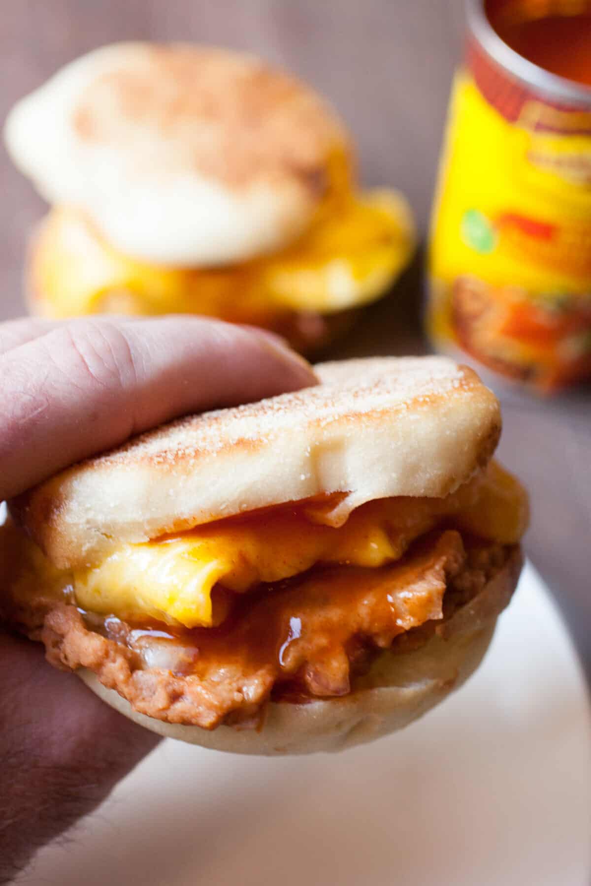 Enchilada Breakfast Sandwiches: A quick and easy breakfast sandwich with delicious Tex-Mex flavors. Don't skip breakfast! | macheesmo.com