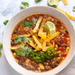 Easy Black Bean Tortilla Soup: When you have no time, but want a really delicious and warming bowl of soup, this is the recipe for you! It's embarrassingly simple to make, but has great flavors. Take the time to make the crispy tortilla strips. They make the difference! | macheesmo.com
