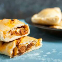 Sausage and Pepper Hot Pockets: These delicious homemade hot pockets are stuffed to the max with sausage, peppers, and cheese. They freeze perfectly as well and make for quick meals whenever you need one! | macheesmo.com