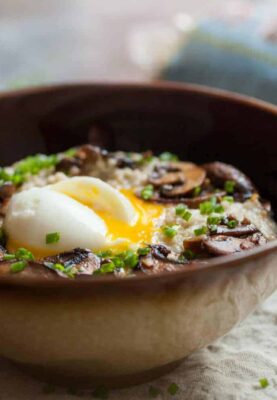 Savory Ginger Mushroom Oatmeal: Savory oatmeal is one of my favorite underrated breakfasts. People are skeptical about it, but once they try it, they will quickly fall in love. This version is packed with mushrooms, ginger, and a perfect soft-boiled egg! | macheesmo.com