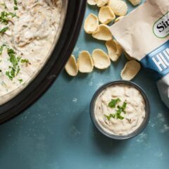 Slow Cooker Caramelized Onion Dip: This warm dip is loaded with flavor thanks to all-night-cooked caramelized onions! It uses mostly Greek yogurt to keep it relatively light and is perfect for a game day appetizer! | macheesmo.com
