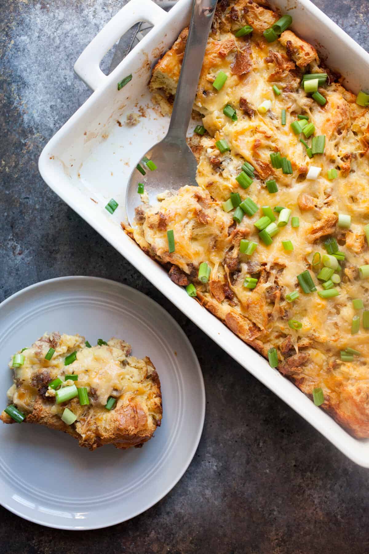 Challah Breakfast Casserole: This is my new favorite breakfast casserole. Easy to mix up the night before with challah bread, sausage, and loads of cheese. It bakes up golden brown and beautiful. YUM. | macheesmo.com