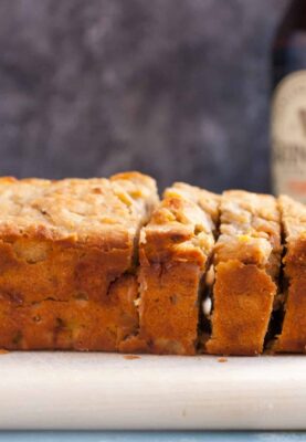 Guinness Banana Bread: At some point in your life you'll have bananas on the verge of spoiling and there's no better use than a good banana bread! This one uses Guinness and has white chocolate folded in! | macheesmo.com