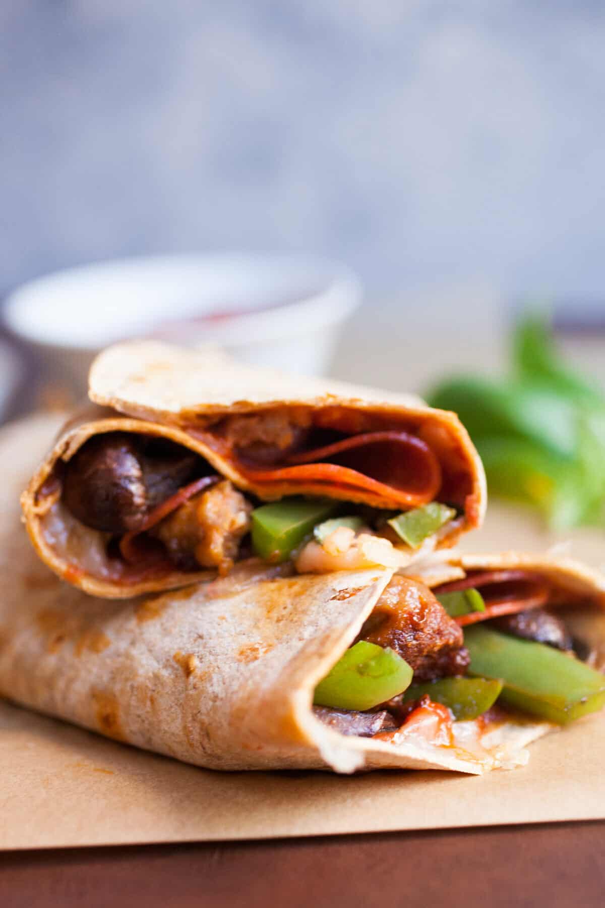 Supreme Pizza Wraps: Everything you love in a Supreme pizza except toned down a bit for wrap size. Delicious flavors and hand held! | macheesmo.com