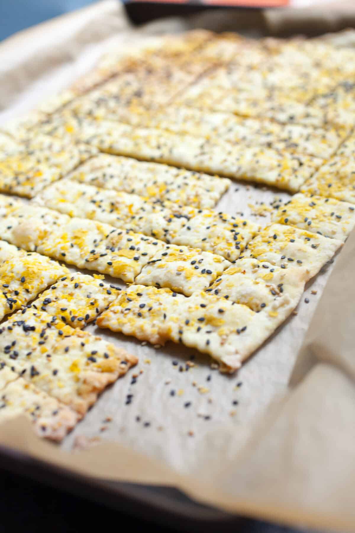 Can't-Stop Crackers: These nutritional yeast crackers are savory, crispy, and SO addictive. Make a double batch because they going to go fast. As in, once you start eating them, you won't stop! | macheesmo.com