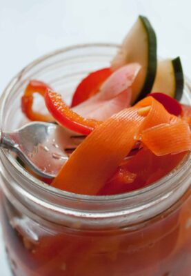Pickle Juice Veggies: After you're done with that big jar of pickles, SAVE THE JUICE. It's good stuff and can be used to make a big jar of quick pickled veggies! I use these on sandwiches and they are actually better than the original pickles! | macheesmo.com