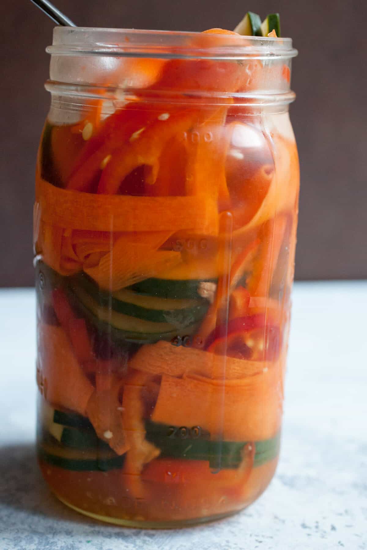 Pickle Juice Veggies: After you're done with that big jar of pickles, SAVE THE JUICE. It's good stuff and can be used to make a big jar of quick pickled veggies! I use these on sandwiches and they are actually better than the original pickles! | macheesmo.com