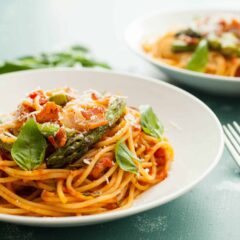 Bacon Asparagus Spaghetti: Perfect spring asparagus cooked with bacon a homemade tomato sauce and tossed with spaghetti! I love this Italian recipe! | macheesmo.com