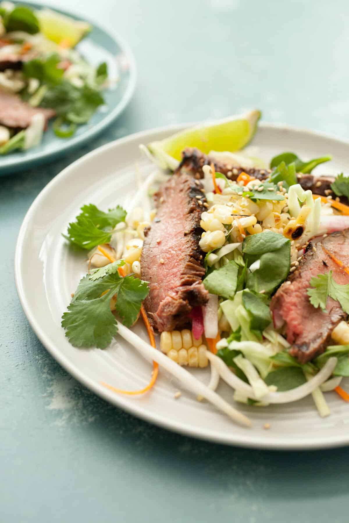 Grilled Steak and Corn Salad: Light and fresh salad perfect for summer! Everything is cooked on the grill. Really fresh Asian-inspired flavors. Great for weekday lunches as well! | macheesmo.com