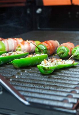 Three varieties of grilled jalapeno poppers.