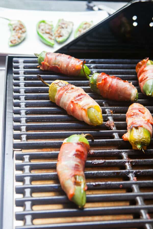 Grilled jalapeno poppers on the grill. 