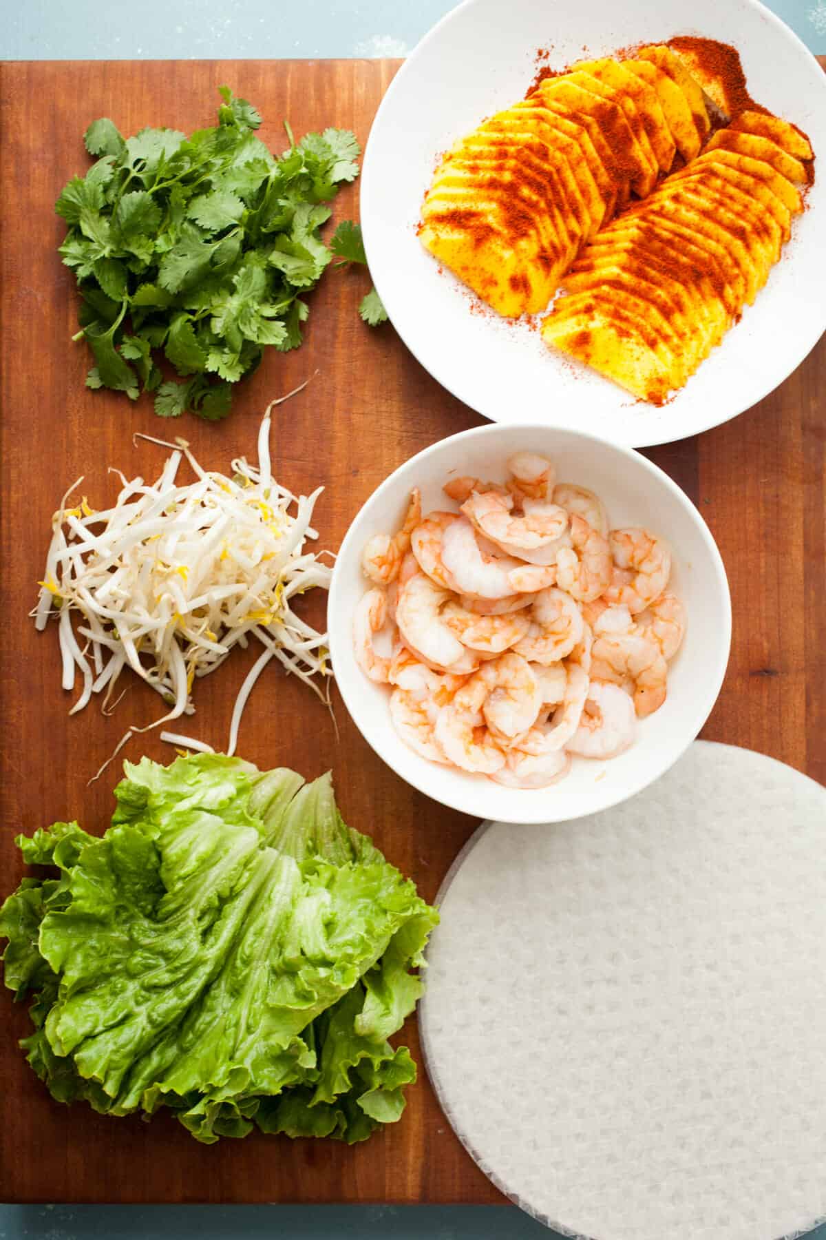 Chili Mango Shrimp Spring Rolls: These light and refreshing spring rolls are the perfect way to beat the summer heat. Serve them as a hearty appetizer or a lighter meal! | macheesmo.com