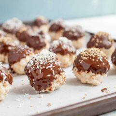 Coconut Rice Krispies Truffles: These easy and delicious truffles have a light rice krispy base and are coated with chocolate and fun toppings. Easy to make and so fun! | macheesmo.com
