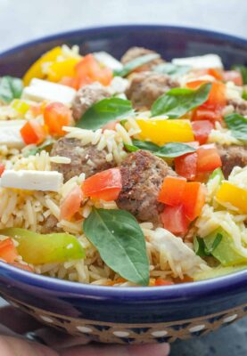 Turkey Meatball Orzo Salad: A light and colorful orzo salad packed with veggies, feta, and homemade turkey meatballs. Great for dinner or lunch! | macheesmo.com