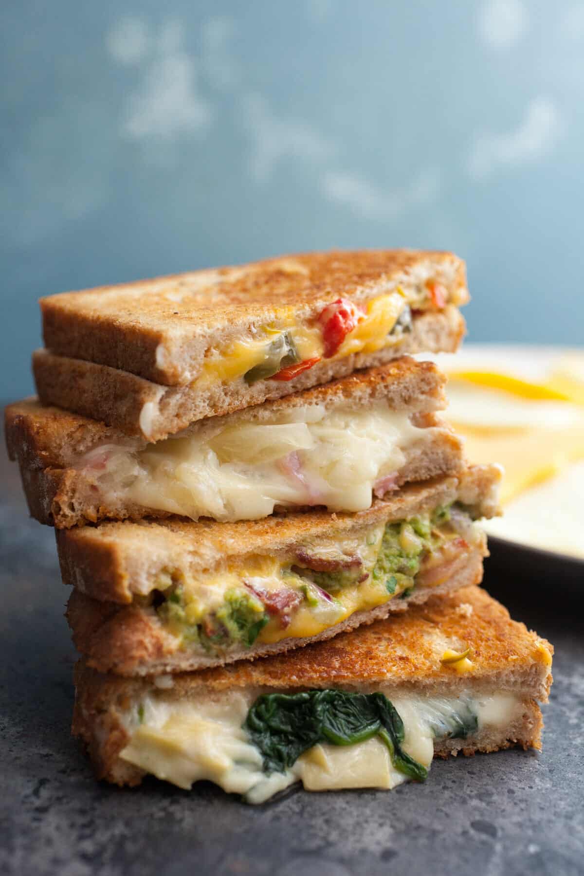 Four Grilled Cheese Sandwiches - Everybody needs a few fun and interesting grilled cheese recipes in their back pocket. These are a few of my favorites! | macheesmo.com