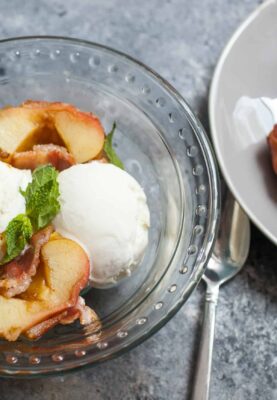 Bacon Wrapped Baked Apples: A slightly savory twist on dessert. Apples stuffed with brown sugar and spices and baked wrapped with bacon. HINT: Serve it with ice cream. YUP. | macheesmo.com