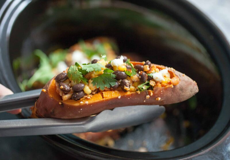 Stuffed Tex Mex Slow Cooker Sweet Potatoes: These sweet potatoes are the perfect mix of spicy, sweet, and savory and you can practically set them and forget them! A great vegetarian friendly meal! | macheesmo.com