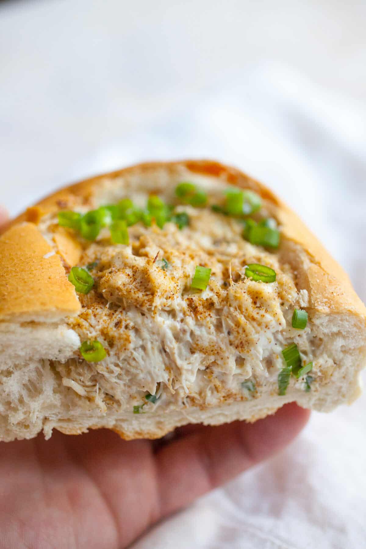 Crab Dip Stuffed French Bread: Easy crab dip stuffed and baked into a French loaf. A great party appetizer! Perfect for New Years! | macheesmo.com