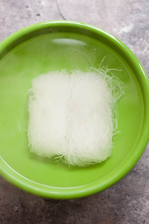 Glass Noodles Soaked in water in a bowl.