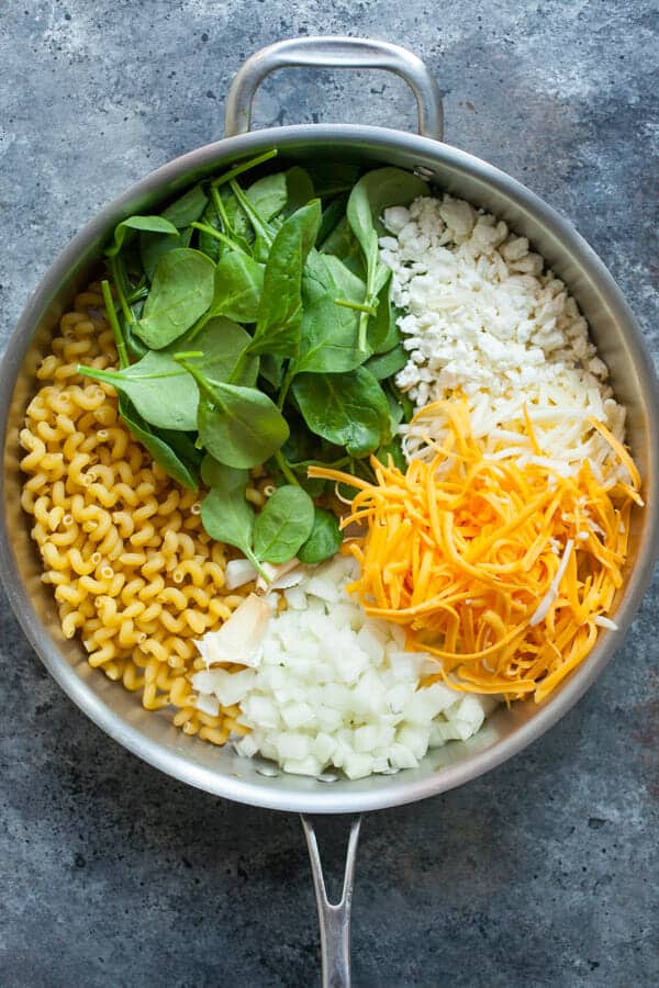 Stuff for mac and cheese in a skillet.