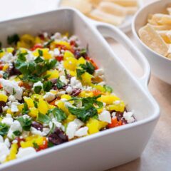 10 Layer Greek Dip: A quick dip that has beautiful colors and flavors. Perfect for a party! | macheesmo.com