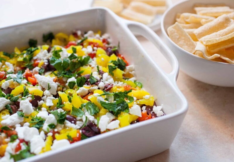 10 Layer Greek Dip: A quick dip that has beautiful colors and flavors. Perfect for a party! | macheesmo.com