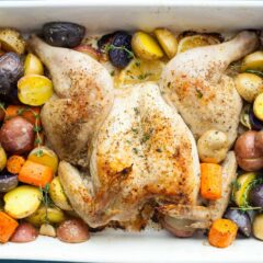 Lemon Pepper Spatchcock Chicken: This is a simple and faster way to make a roast chicken. It has easy-to-find herbs and spices and you bake the whole meal at once! | macheesmo.com