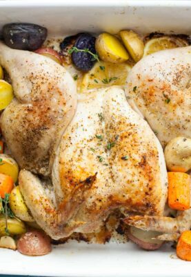 Lemon Pepper Spatchcock Chicken: This is a simple and faster way to make a roast chicken. It has easy-to-find herbs and spices and you bake the whole meal at once! | macheesmo.com
