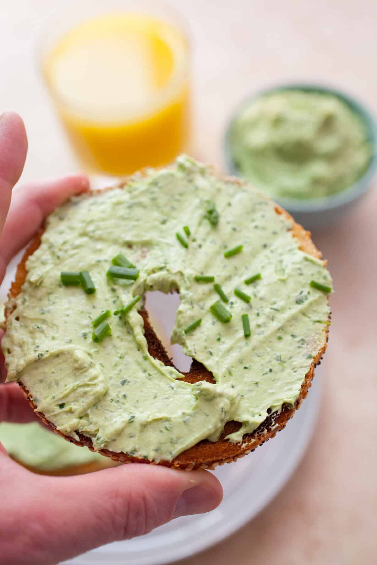 Lucky Green Cream Cheese: This lightened-up cream cheese spread is packed with herbs and ripe avocado. It makes for the perfect schmear and is a great St. Patty's Day breakfast! | macheesmo.com