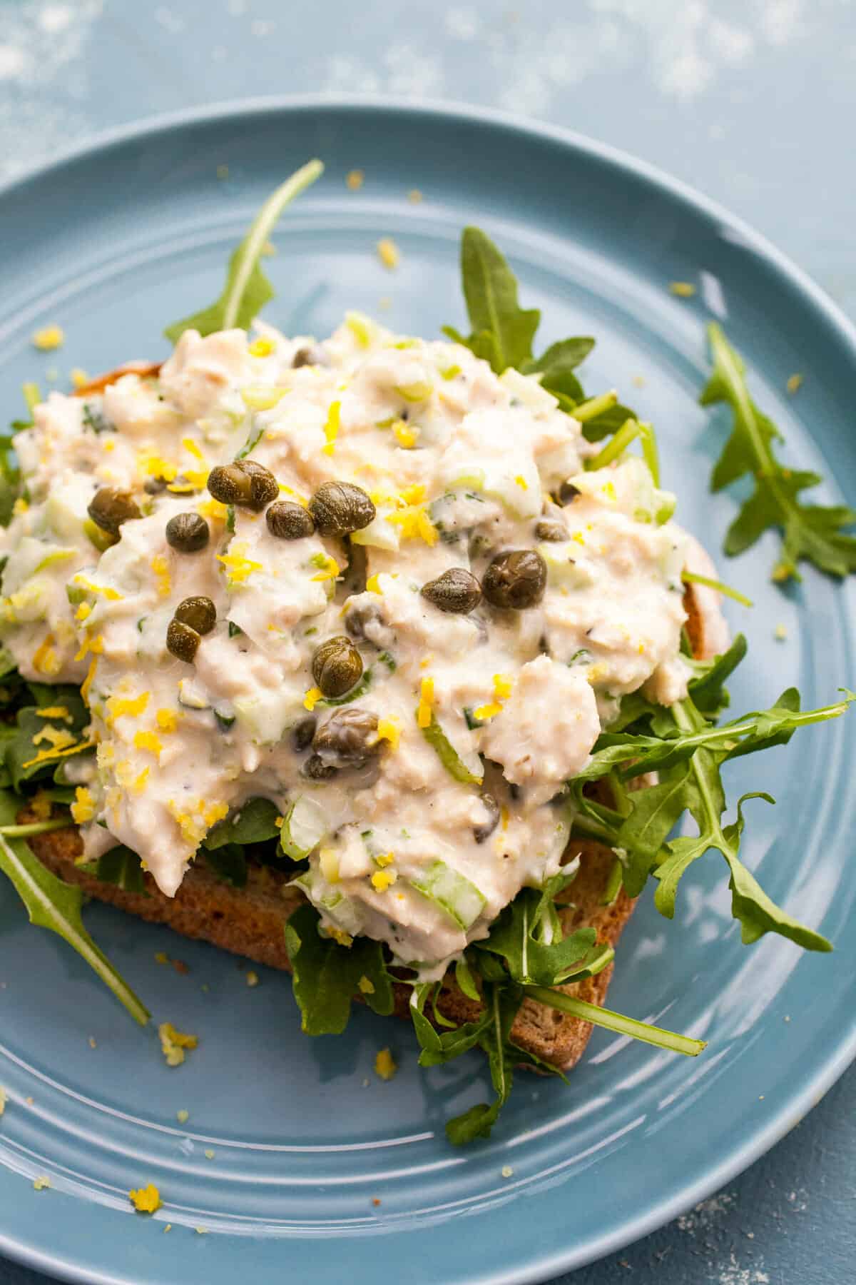 Lemon Zinger Tuna Salad: Not your boring tuna salad. This one is packed with crunchy veggies and bright lemons and capers. Great on salad or in sandwich form! | macheesmo.com