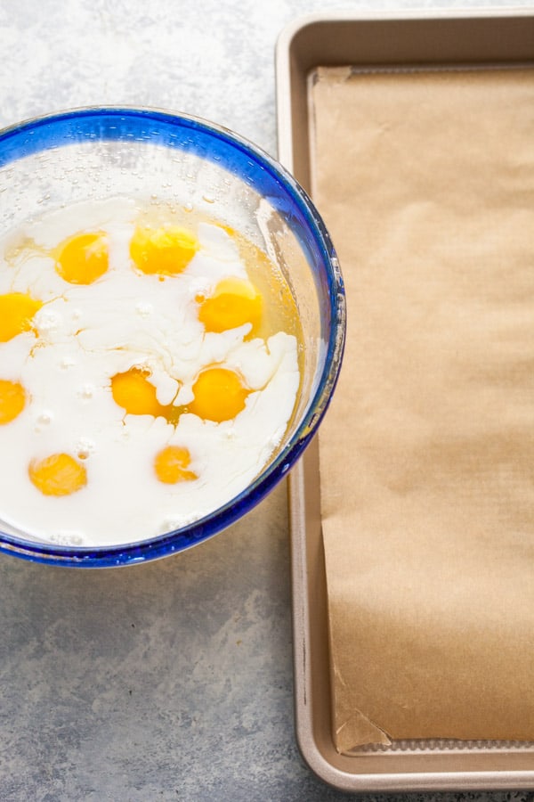 Whisking eggs for the sheet pan omelet.