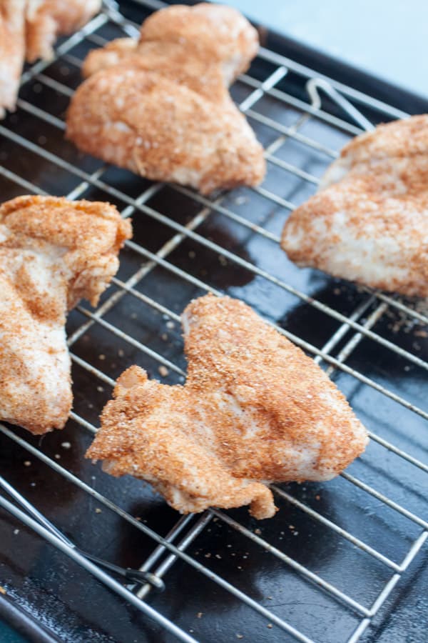 Baked Cajun Chicken Wings on wire rack.