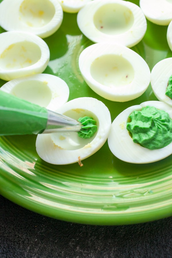 Filling Halloween Deviled Eggs.